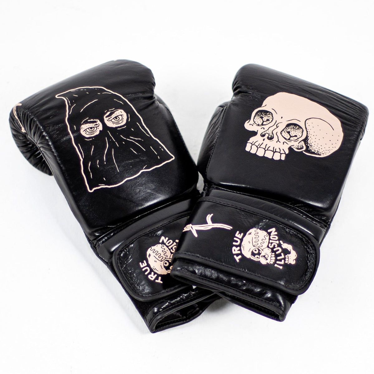 True Illusion Muay Thai Gloves - Executioner - Vegan Leather, pair flat lay showing hooded figure and skull graphics in rose