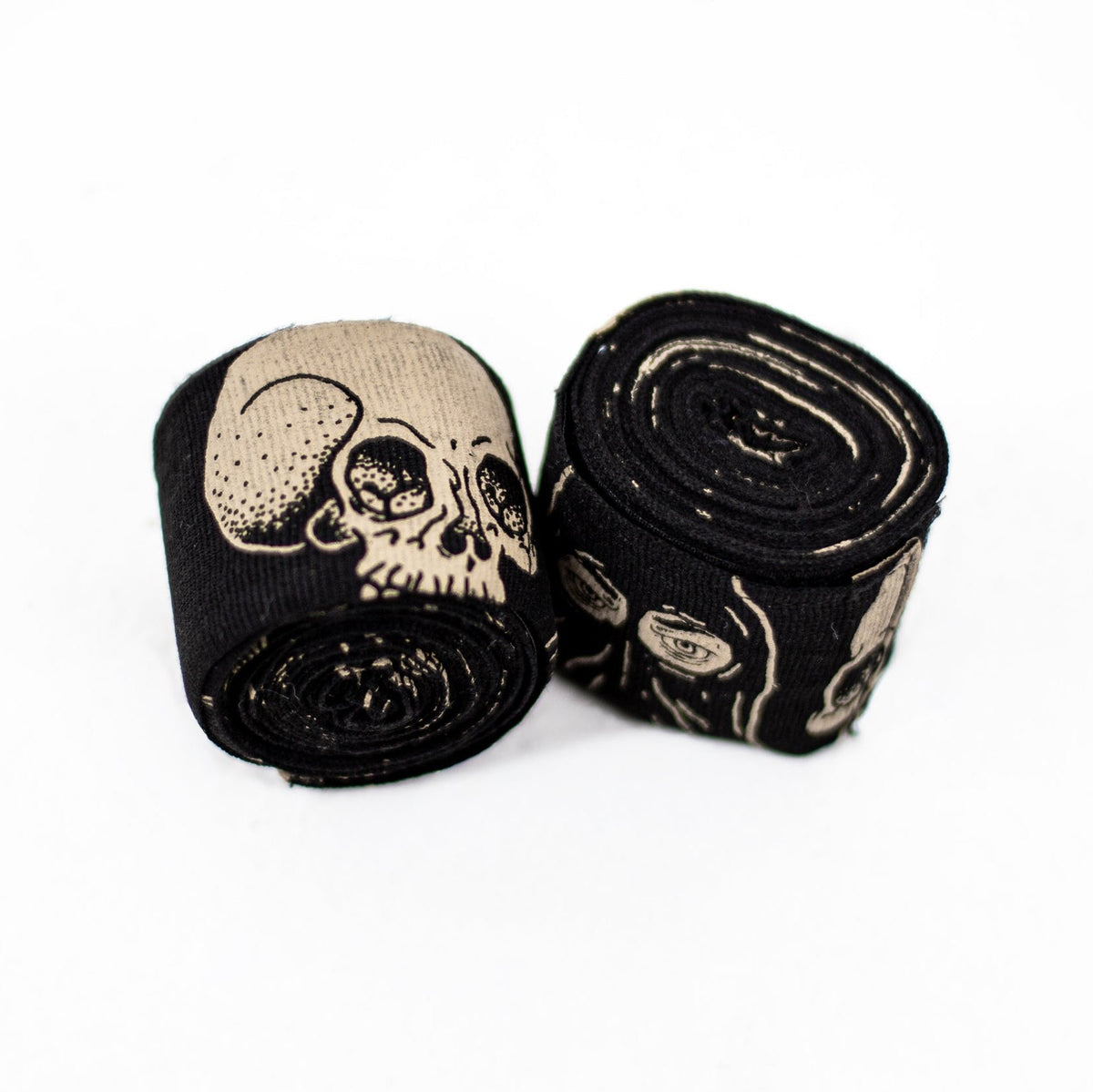 True Illusion Executioner hand wraps and boxing accessories, pair of rolled wraps with skull and eye graphic print in black