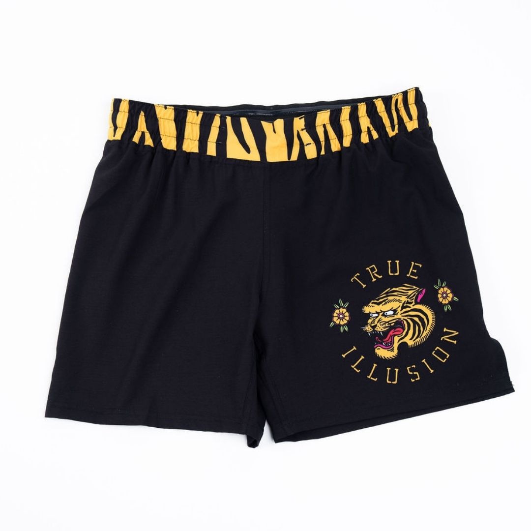 True Illusion BJJ Shorts - Tiger, front flat lay showing tiger-print waistband and tattoo-style tiger graphic on left leg