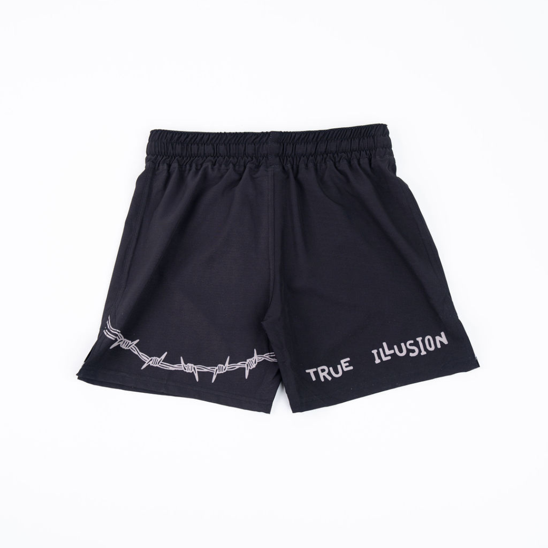 True Illusion Executioner BJJ Shorts, front flat lay in black with barbed wire graphic and logo across the hem